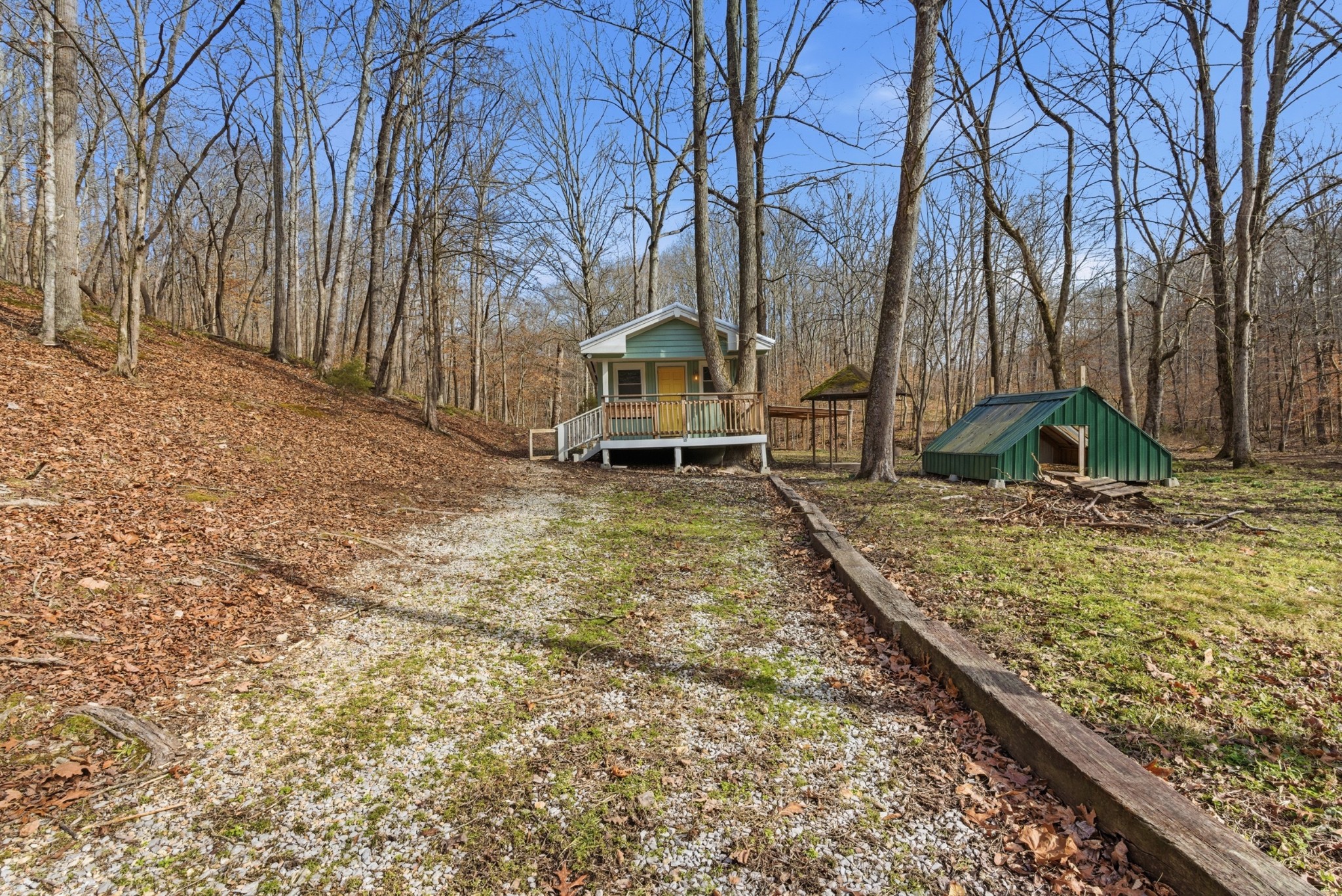3972 Skelley Road Santa Fe, TN 38482 - Photo 3 of 47 a front view of a house with a yard