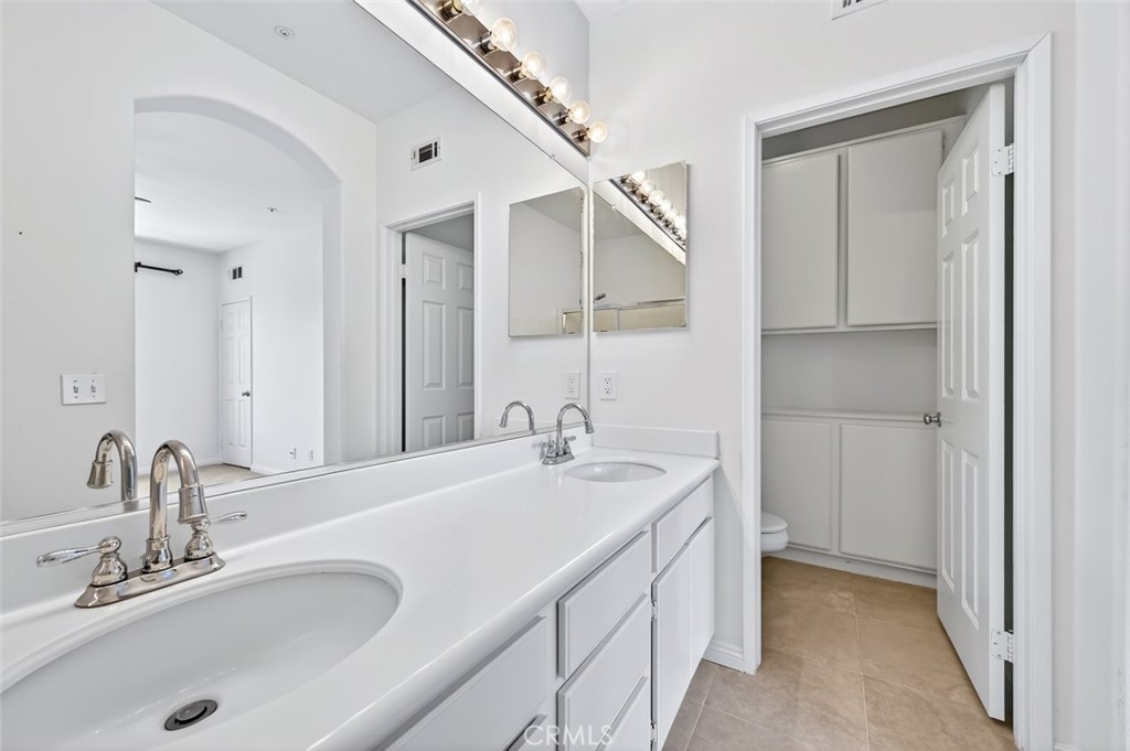 447 Ridgeway Irvine, CA 92620 - Photo 35 of 88 a bathroom with a sink and a mirror