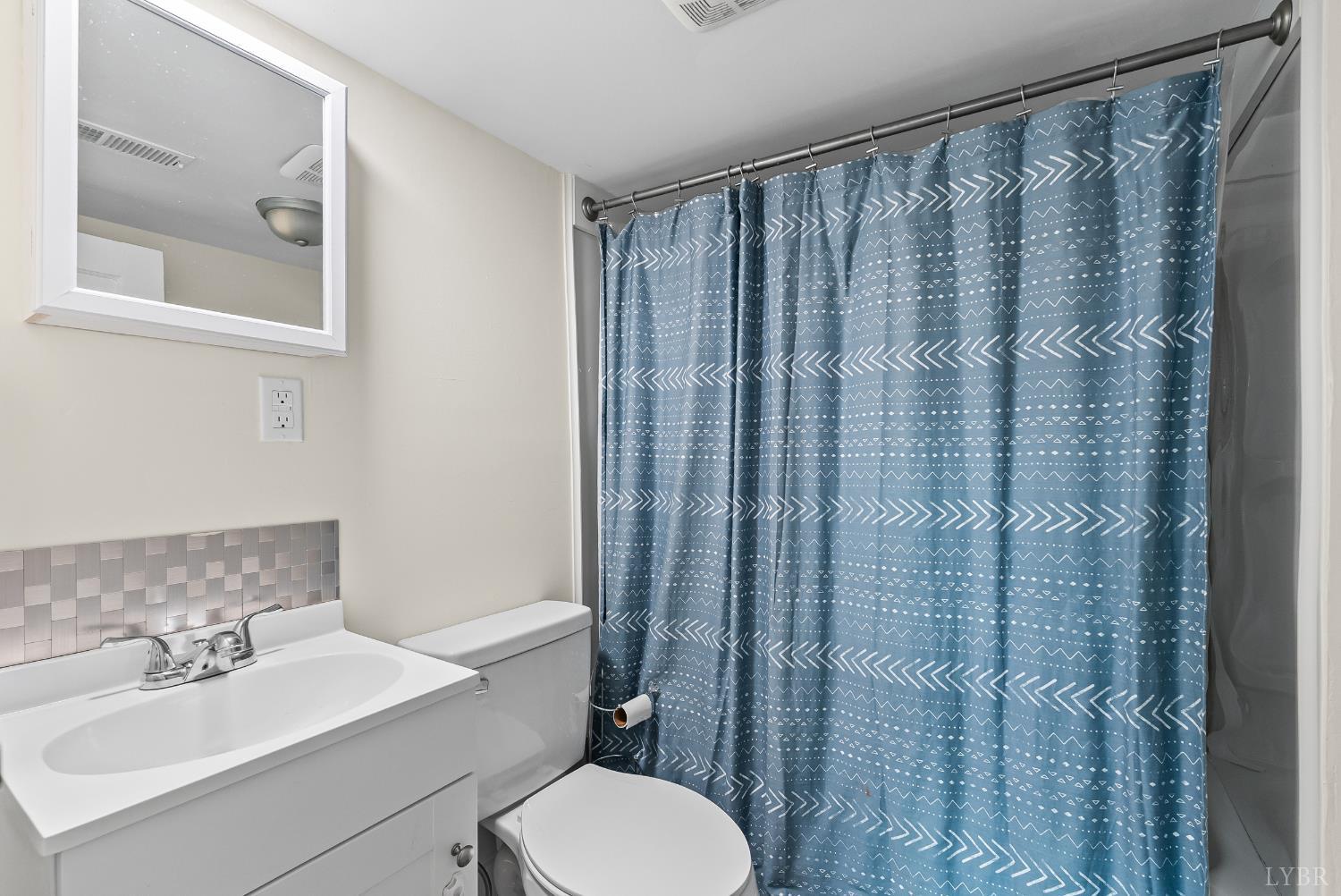 105 Chambers Street Lynchburg, VA 24501 - Photo 19 of 26 a bathroom with a sink and toilet