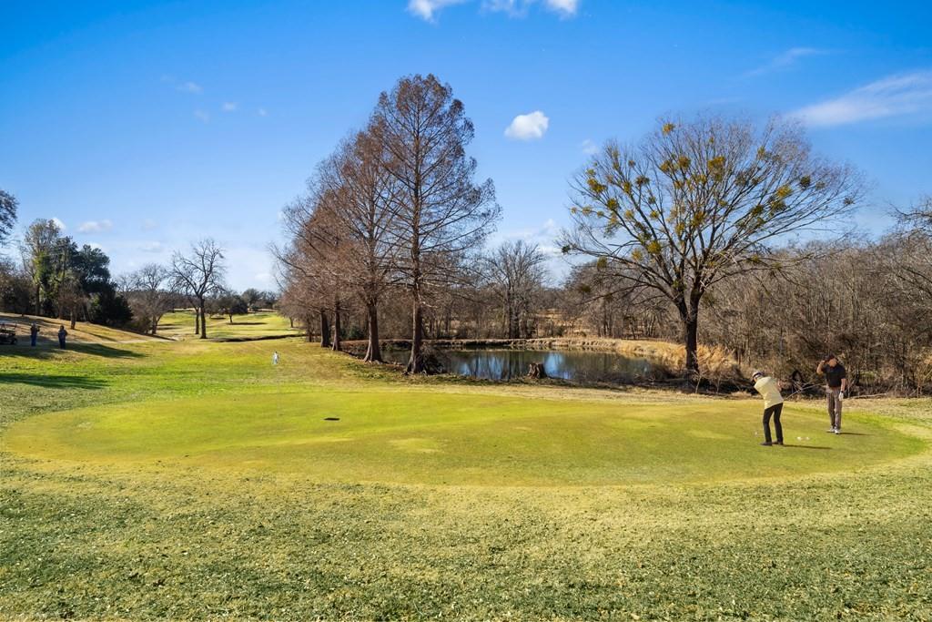 0 Co Road Kemp, TX 75143 - Photo 19 of 40 a view of a swimming pool with a house in the background