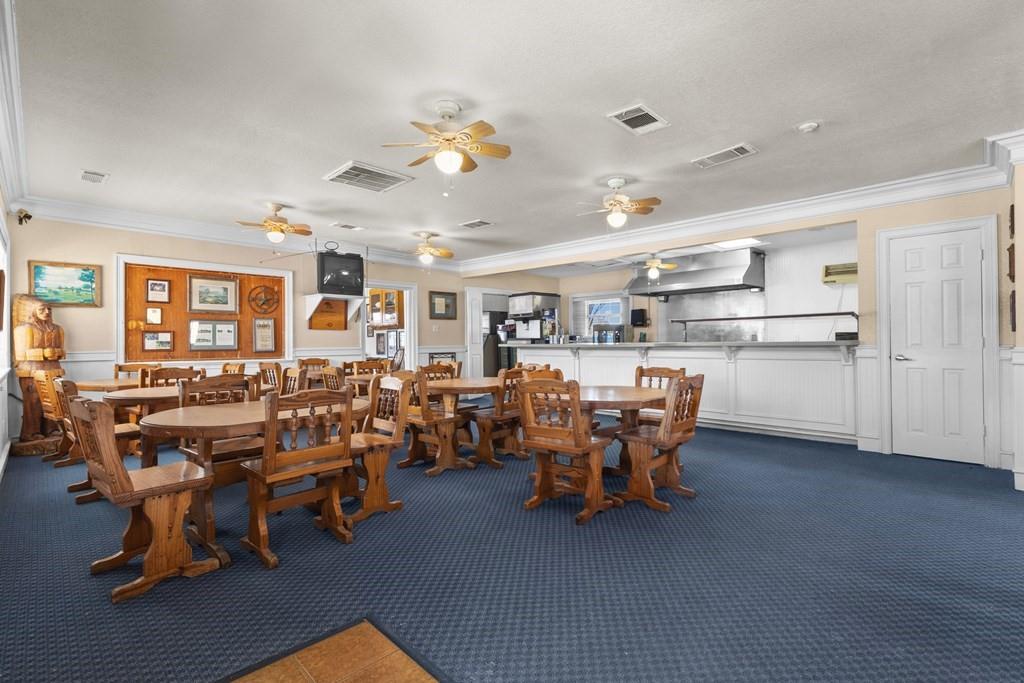 0 Co Road Kemp, TX 75143 - Photo 35 of 40 a group of chairs sitting in a kitchen and dining room