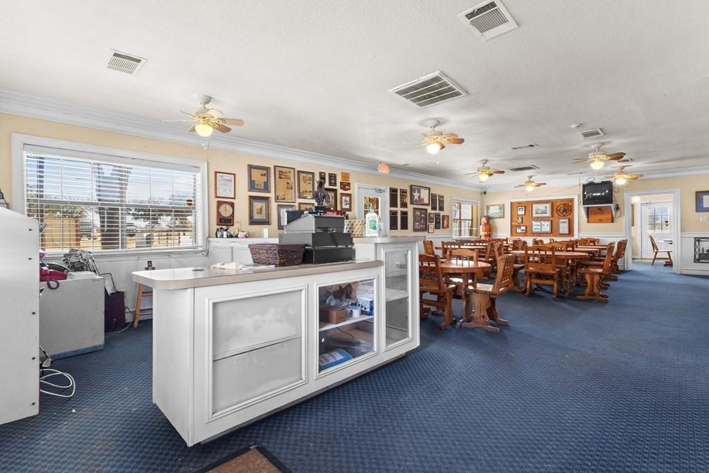 0 Co Road Kemp, TX 75143 - Photo 39 of 40 a kitchen that has a lot of cabinets a sink and a stove in it