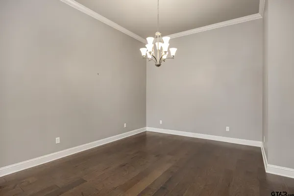 a view of kitchen with wooden floor and a kitchen