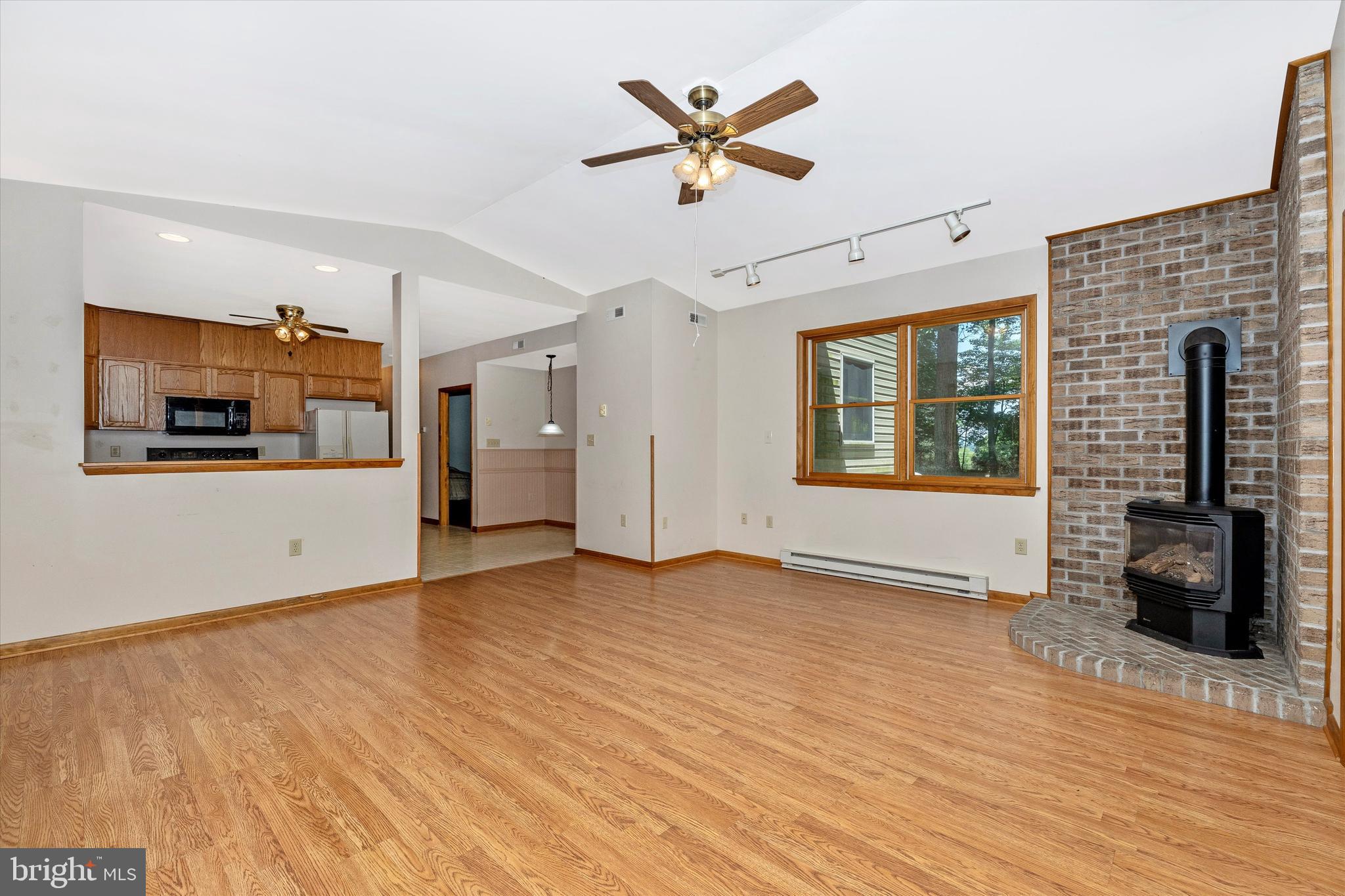 6119 Quinn Road Frederick, MD 21701 - Photo 12 of 37 Family Room with Propane Stove