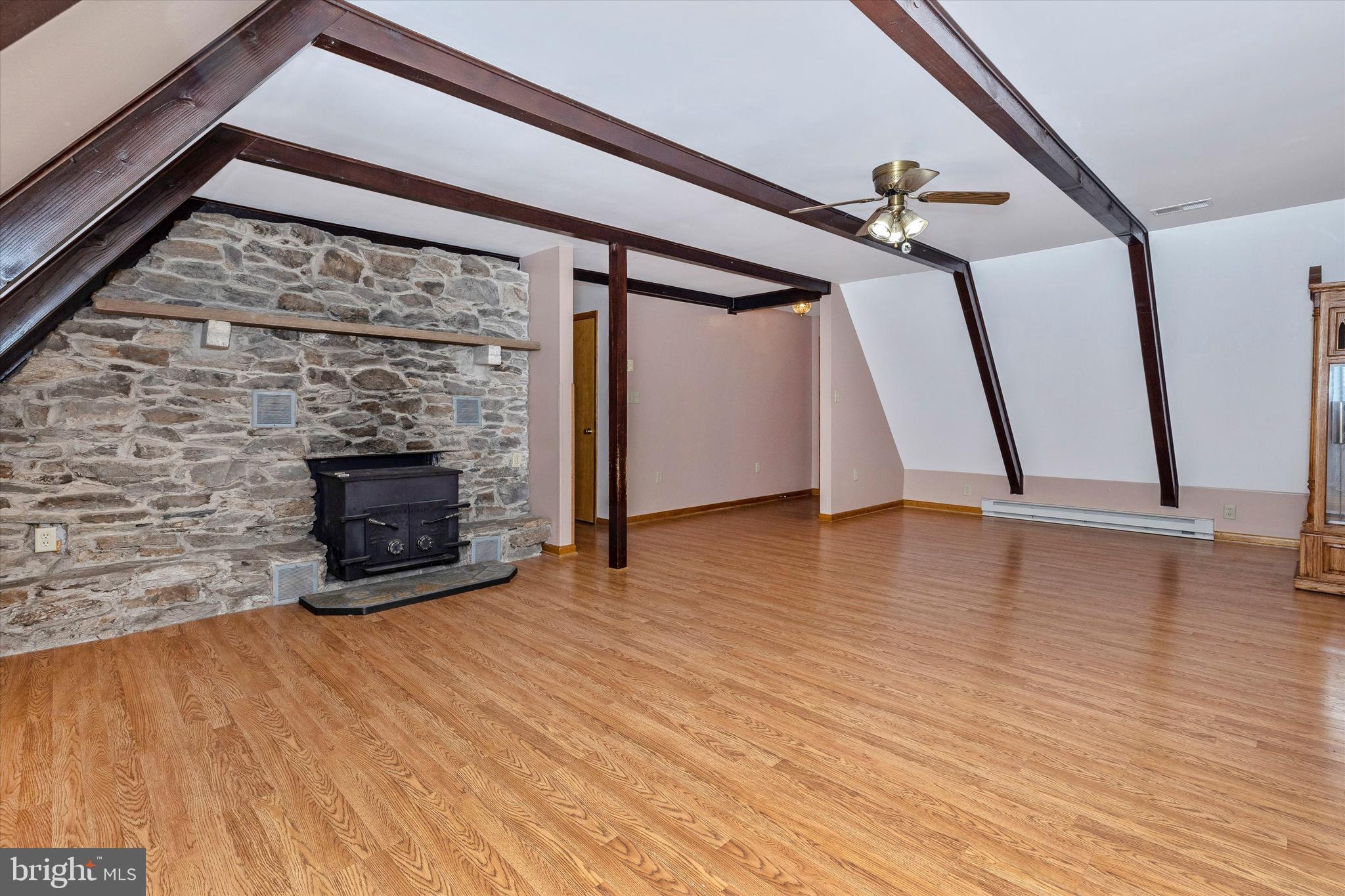 6119 Quinn Road Frederick, MD 21701 - Photo 6 of 37 Living Room with Stone Accent Wall