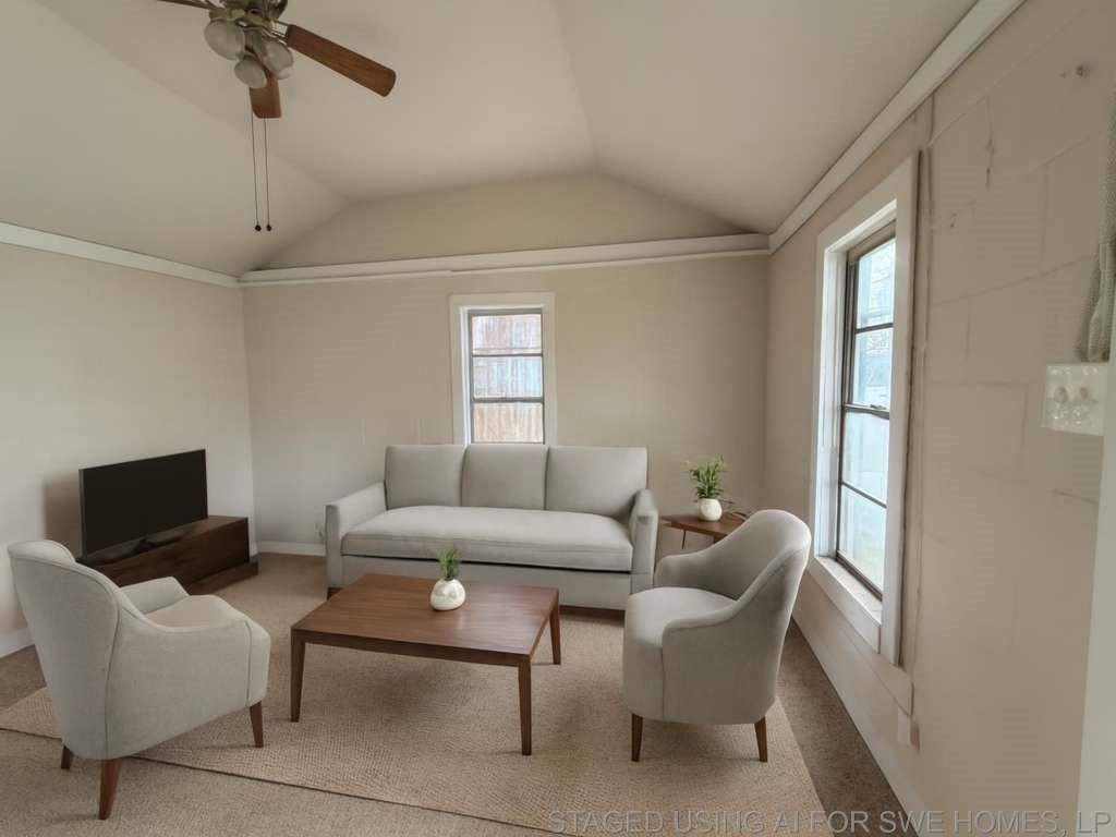 a living room with furniture and a window
