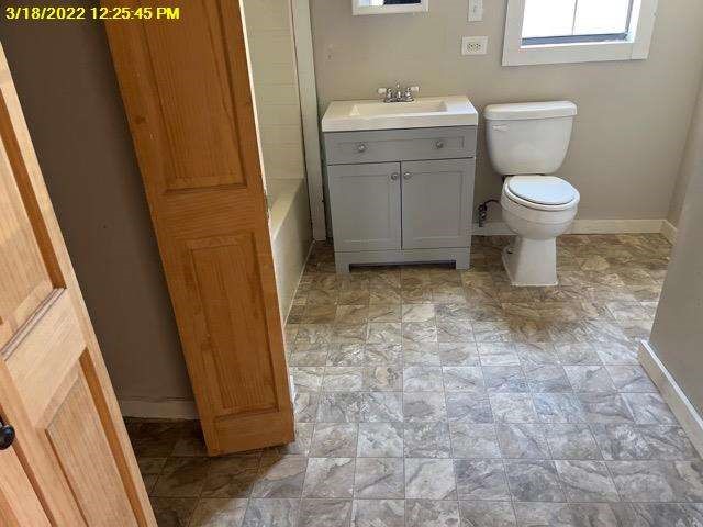 9583 South 3rd St Road Waco, TX 76706 - Photo 10 of 12 a bathroom with a sink and toilet