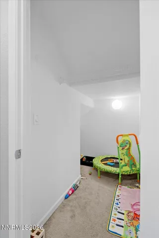 a room with toys and wooden floor