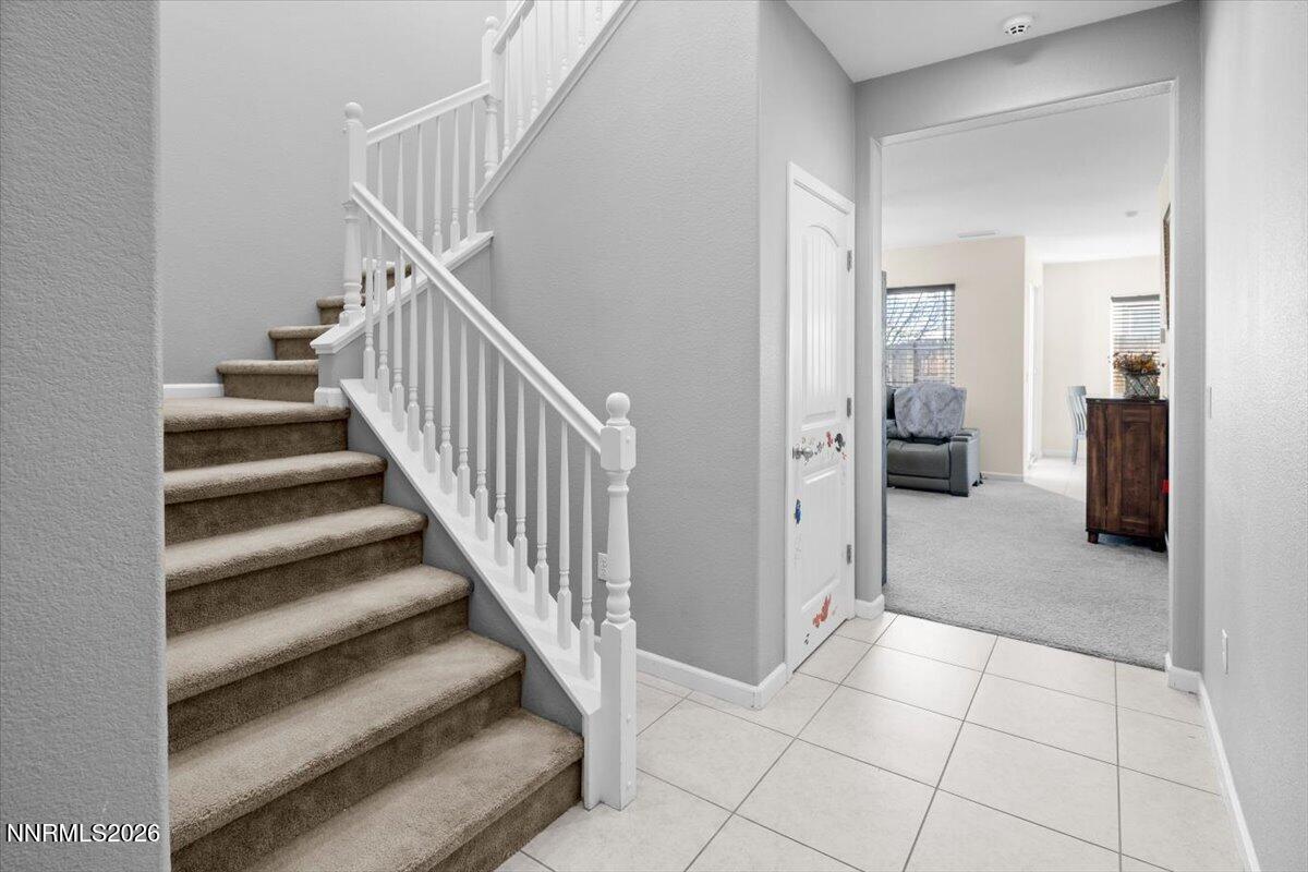 2190 Bears Ranch Drive Reno, NV 89521 - Photo 2 of 23 a view of a hallway with entryway and kitchen view