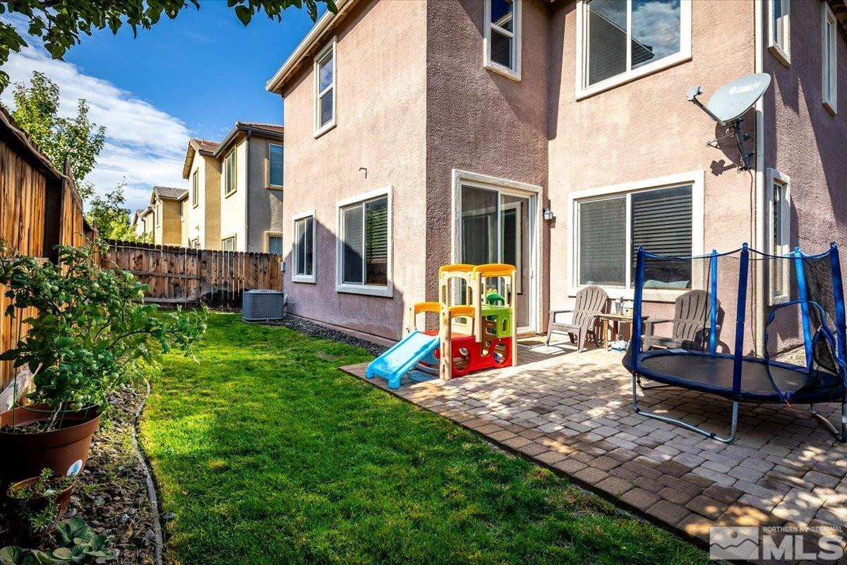 2190 Bears Ranch Drive Reno, NV 89521 - Photo 22 of 23 a view of a backyard with a table and chairs