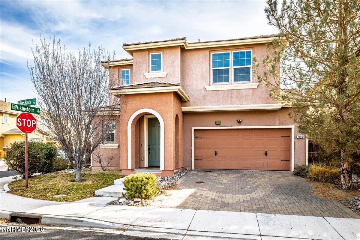 2190 Bears Ranch Drive Reno, NV 89521 - Photo 23 of 23 a view of a house with a yard and garage