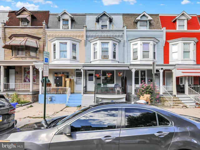 a front view of a building with street view