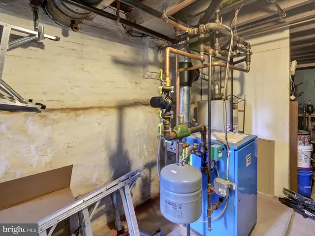a bathroom with a toilet sink and shower