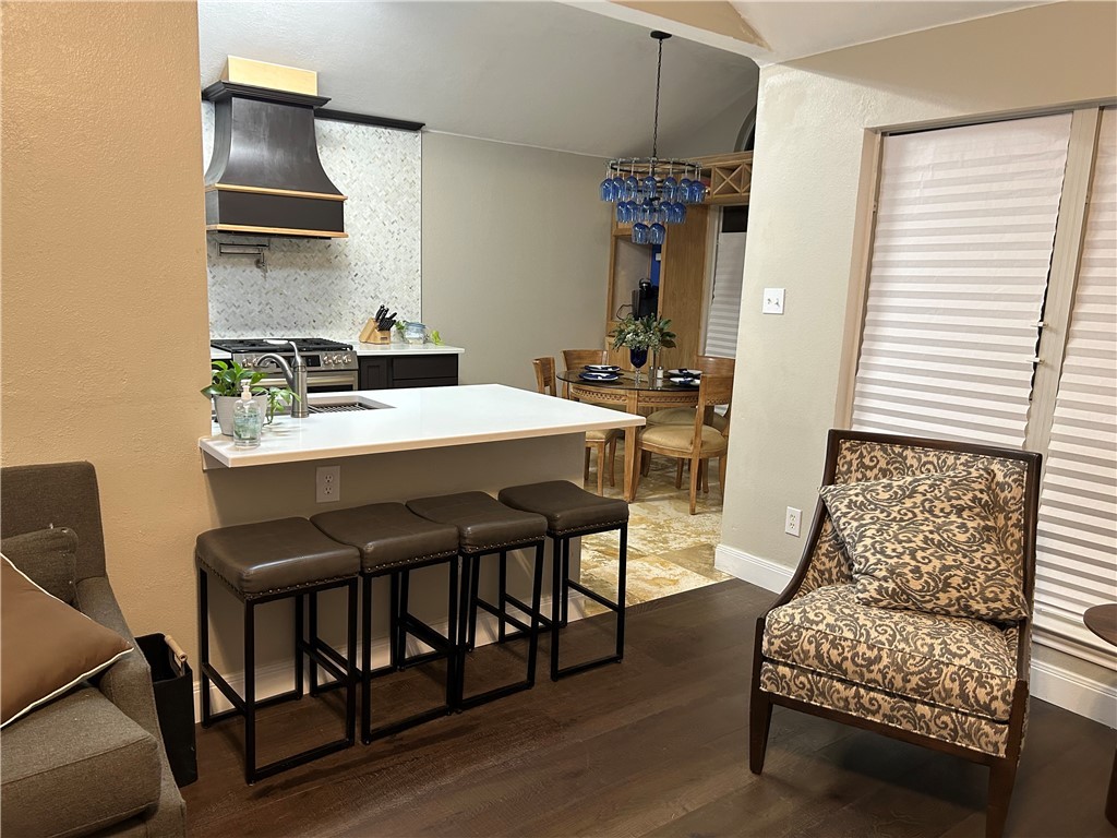 2230 Howell Avenue Bryan, TX 77803 - Photo 6 of 14 a view of a dining room with furniture and wooden floor