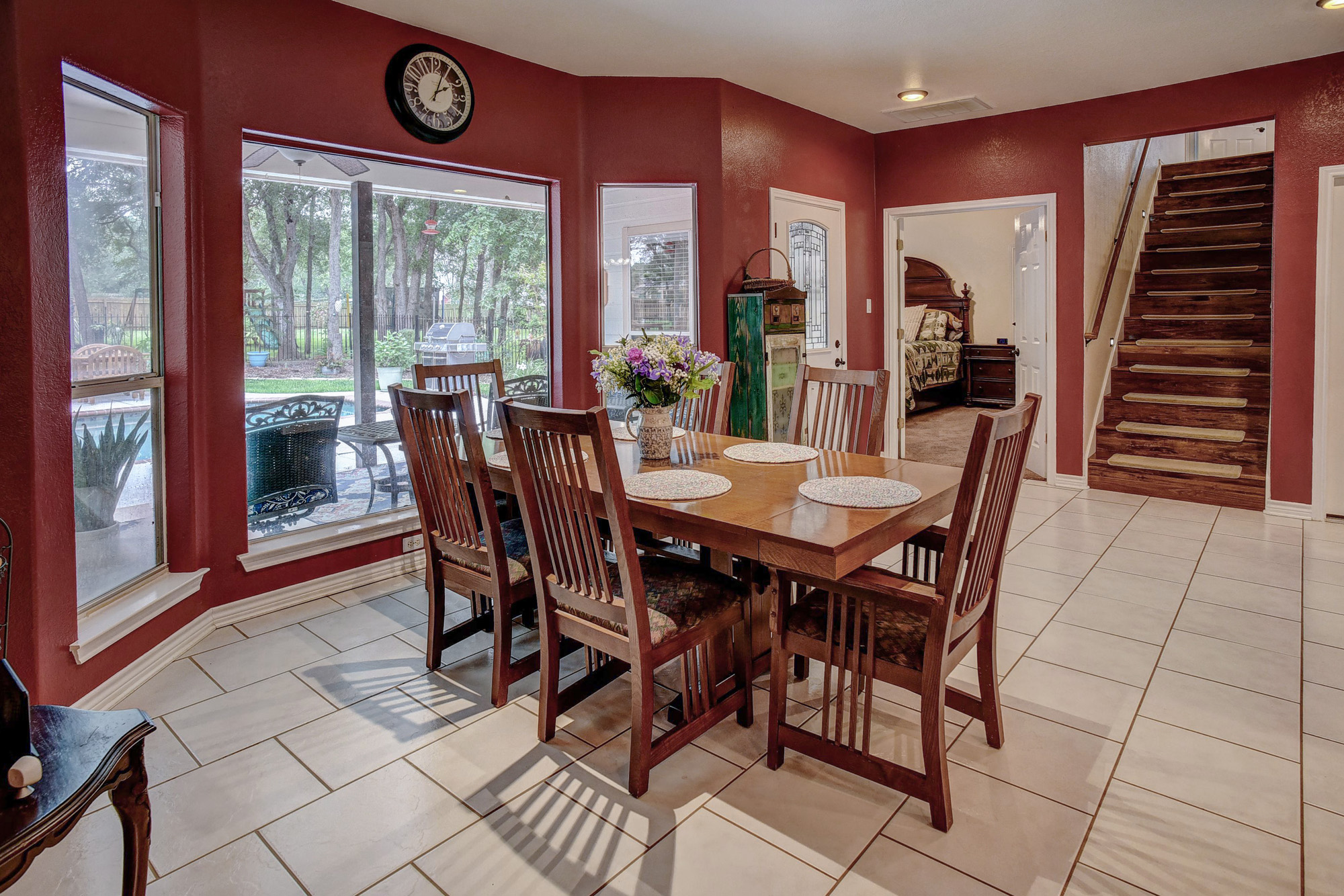 147 Spring Meadow Road Bastrop, TX 78602 - Photo 11 of 40 a view of a dining room with furniture window and wooden floor