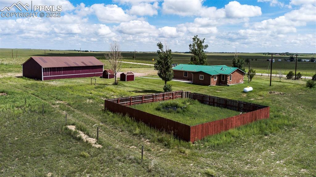 38620 Trogilo Road Rush, CO 80833 - Photo 30 of 46 an aerial view of a house having yard
