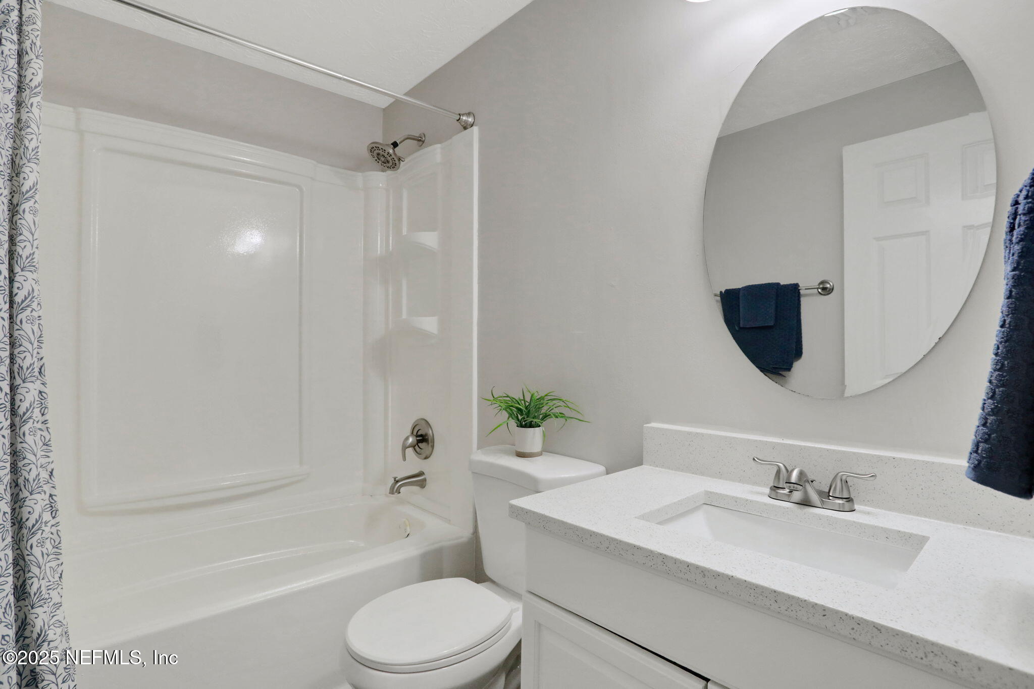 3822 Packard Drive Jacksonville, FL 32246 - Photo 19 of 38 a bathroom with a granite countertop toilet sink and bathtub