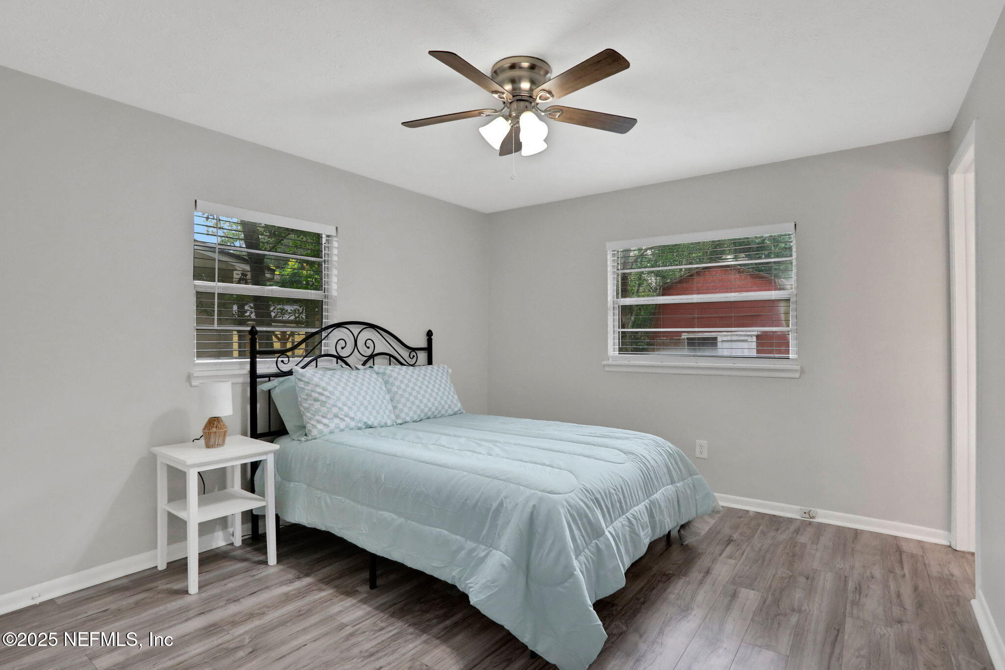 3822 Packard Drive Jacksonville, FL 32246 - Photo 26 of 38 a bedroom with a bed and a window