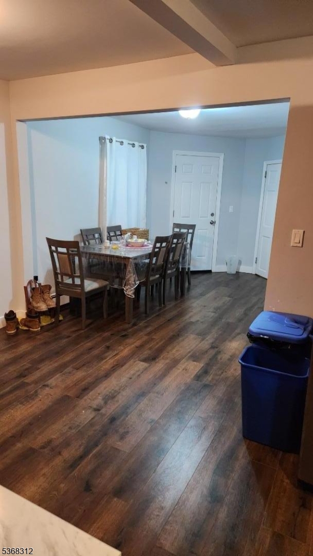 522 Chestnut Street, Unit 2 Orange, NJ 07050 - Photo 4 of 8 a view of a dining room with furniture and wooden floor