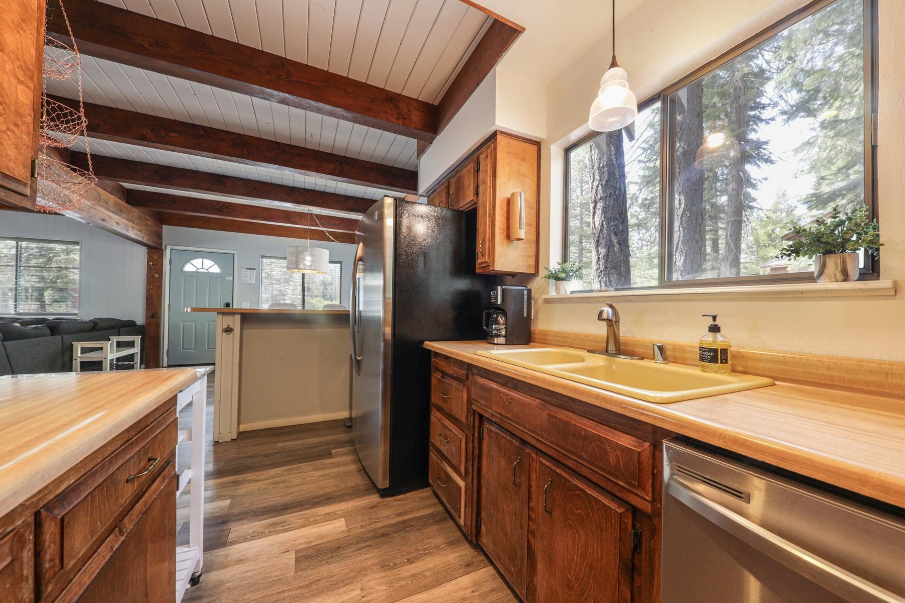 5656 Victoria Road Carnelian Bay, CA 96140 - Photo 15 of 28 a kitchen with a sink and cabinets