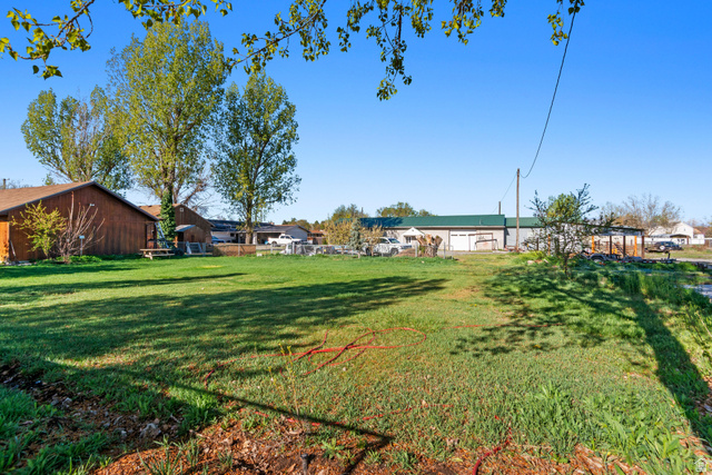 49 North 2830th West, Unit 3 Provo, UT 84601 - Photo 5 of 13 View of green lawn