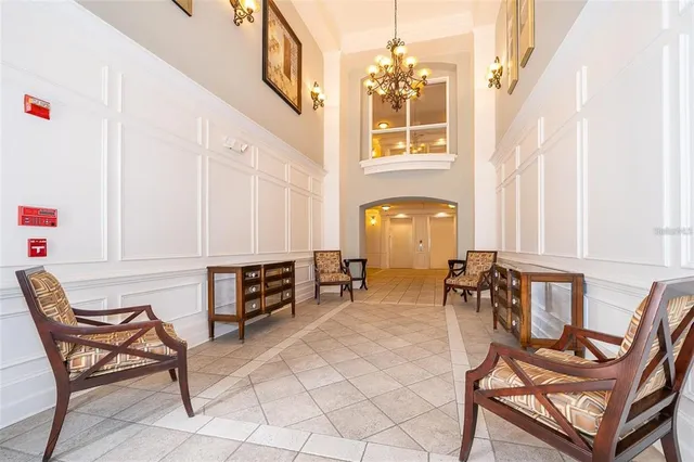 a view of a livingroom with furniture and lounge chair