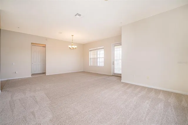 a bathroom with a tub a sink and a mirror