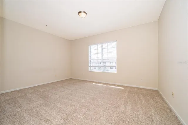 a bathroom with a glass door shower a sink and a mirror