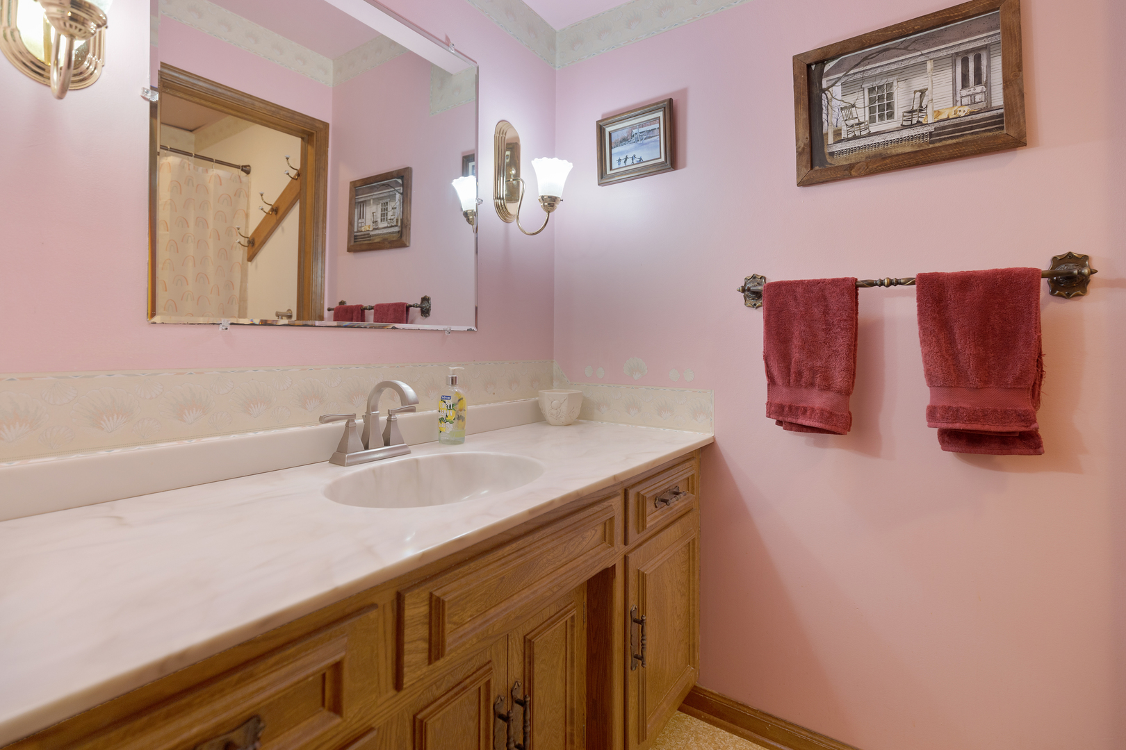 50W424 Plank Road Sycamore, IL 60178 - Photo 19 of 22 a bathroom with a sink and a mirror