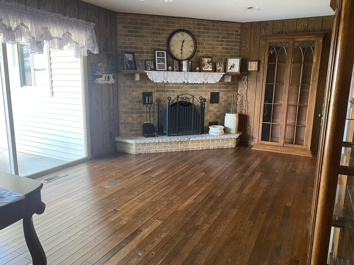50W424 Plank Road Sycamore, IL 60178 - Photo 4 of 22 a view of fireplace and wooden floor