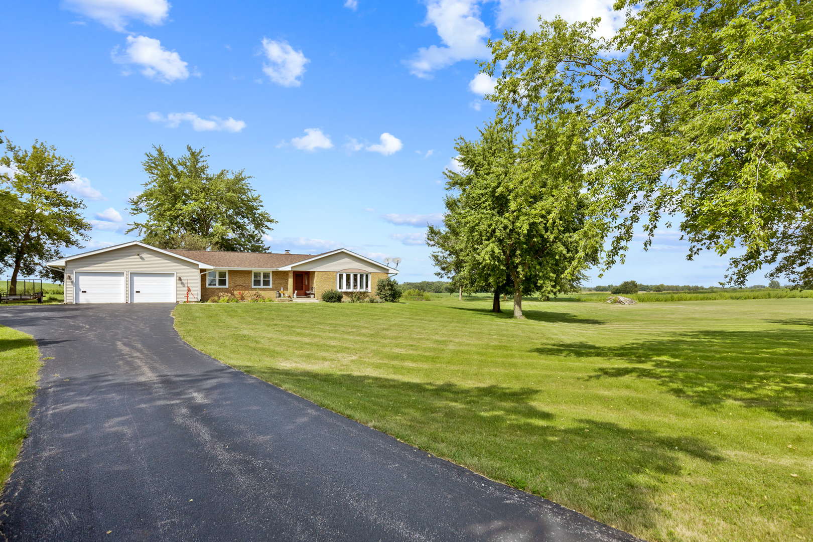 50W424 Plank Road Sycamore, IL 60178 - Photo 9 of 22 a view of a house with a yard