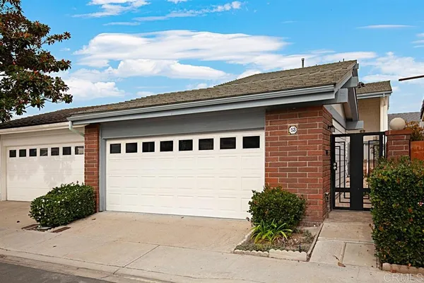 a house view with a garden space