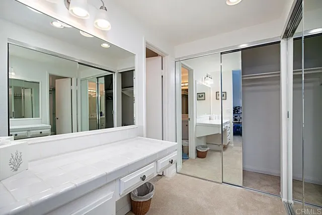 a bathroom with a sink and mirror