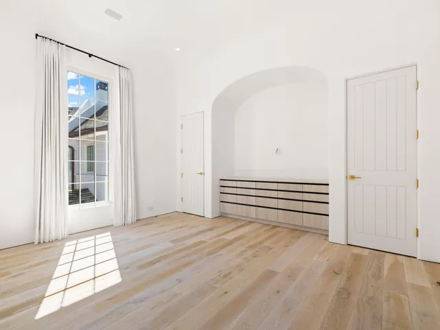 a view of a house with backyard and porch