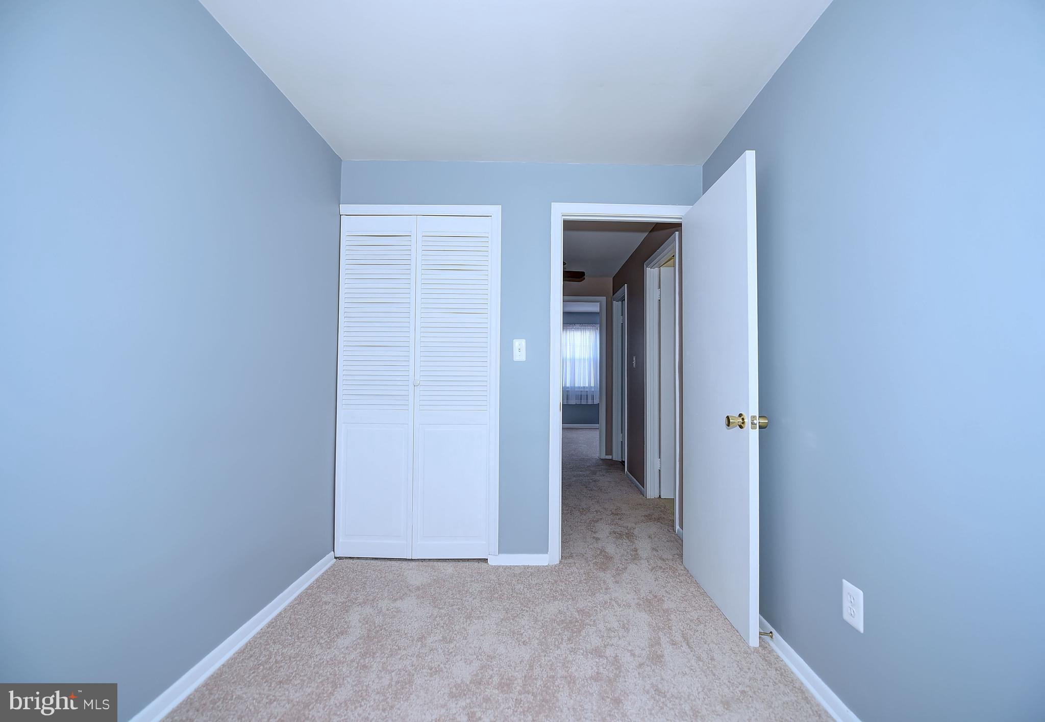 8108 Mid Haven Road Baltimore, MD 21222 - Photo 19 of 28 a view of hallway with closet