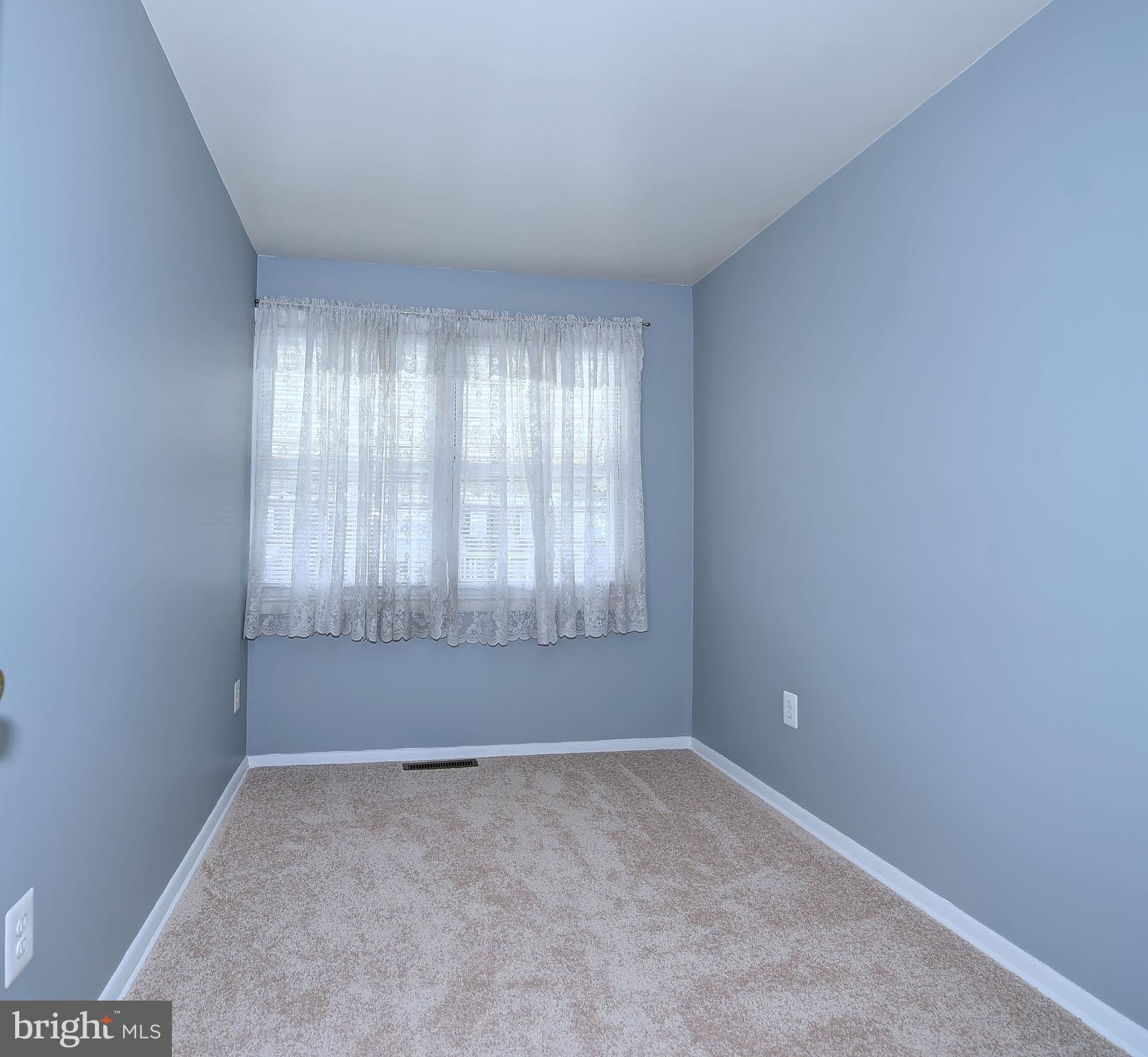 8108 Mid Haven Road Baltimore, MD 21222 - Photo 20 of 28 an empty room with windows