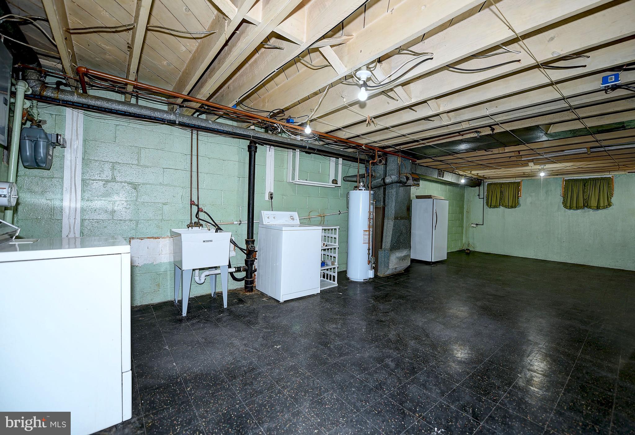 8108 Mid Haven Road Baltimore, MD 21222 - Photo 25 of 28 a view of a room with utility room