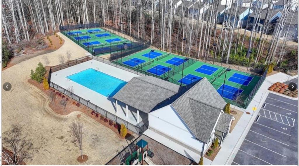 2443 Walnut Tree Lane Buford, GA 30519 - Photo 14 of 15 a view of a room with furniture and rug