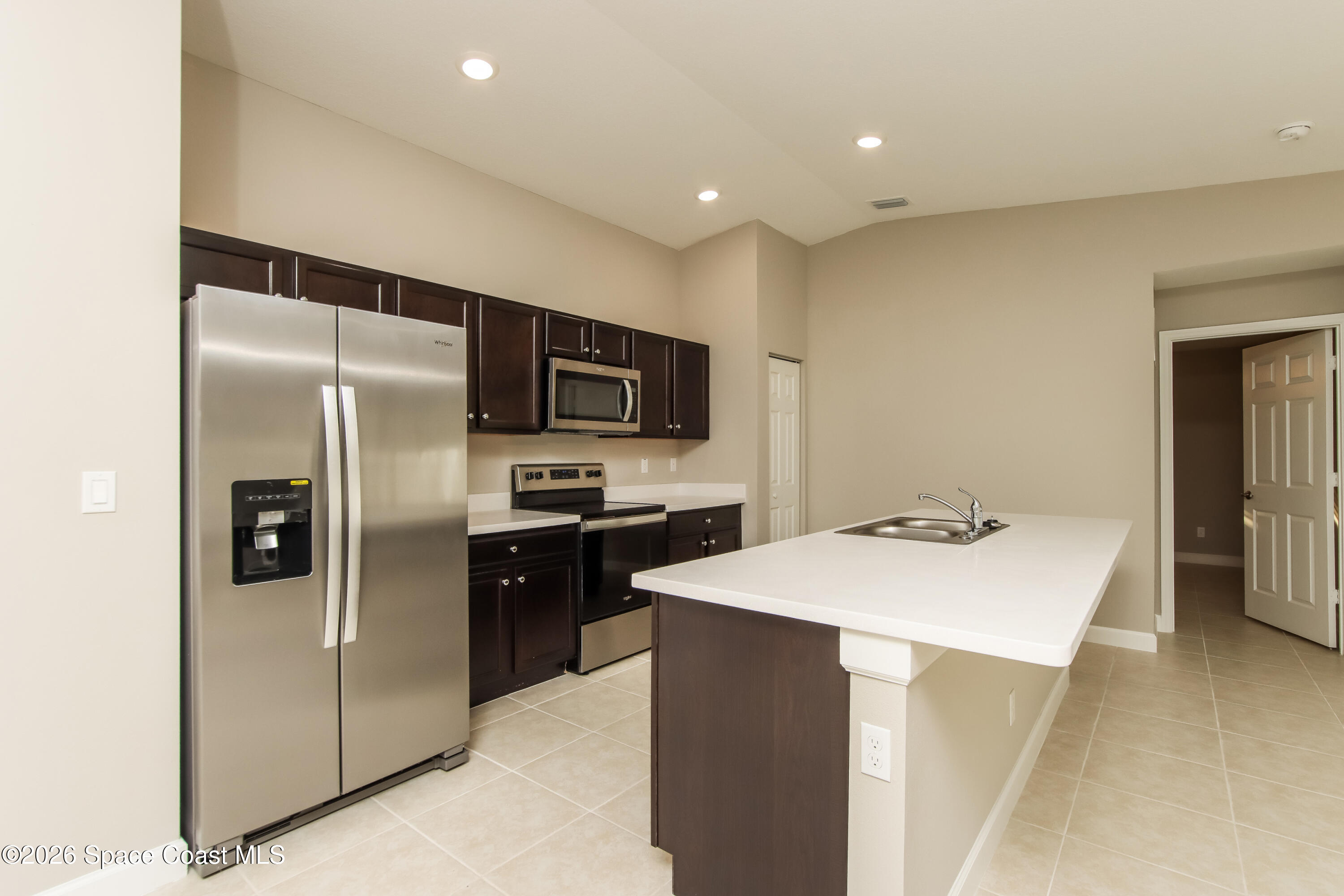 2110 Watkins Road Southeast Palm Bay, FL 32909 - Photo 6 of 15 1001399.2110 Watkins Road SE - Kitchen