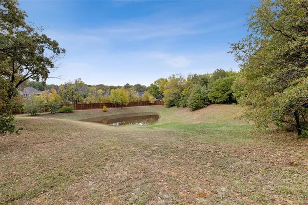 a view of backyard with green space