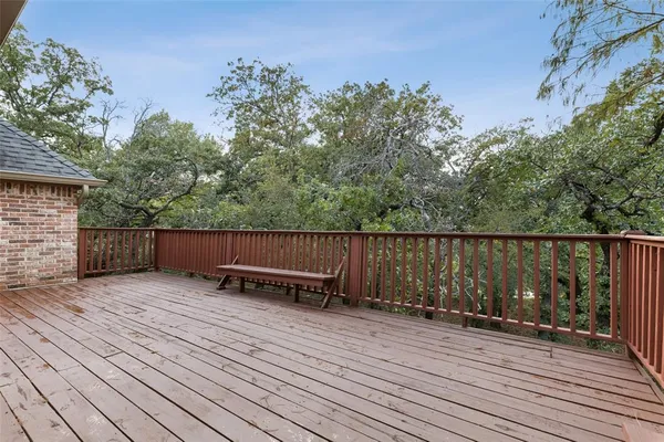 a backyard of a house with wooden floor