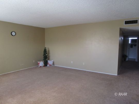232 South Silver Ridge Street Ridgecrest, CA 93555 - Photo 3 of 19 an empty room with closet