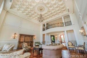 50 Wakefield Staten Island, NY 10312 - Photo 22 of 48 a view of a livingroom with furniture wooden floor and a chandelier