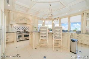 50 Wakefield Staten Island, NY 10312 - Photo 27 of 48 a view of a dining room with furniture and a chandelier