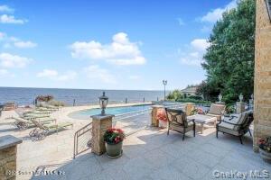 50 Wakefield Staten Island, NY 10312 - Photo 35 of 48 a view of a terrace with furniture and stove