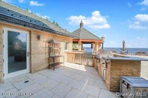 50 Wakefield Staten Island, NY 10312 - Photo 46 of 48 a view of a kitchen with a sink and cabinets