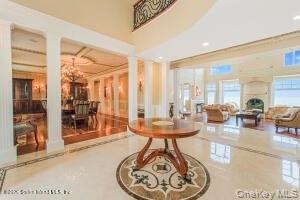 50 Wakefield Staten Island, NY 10312 - Photo 7 of 48 a dining room with furniture a rug and a chandelier