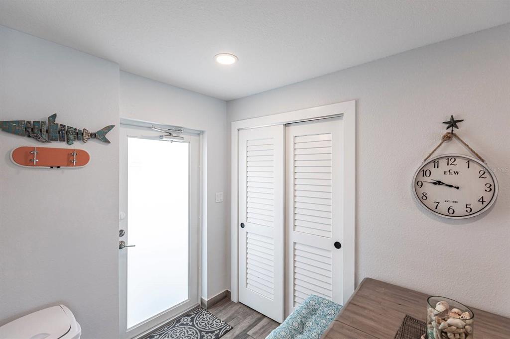 6154 Midnight Pass Road, Unit 202 Sarasota, FL 34242 - Photo 2 of 26 a view of a hallway with elevator