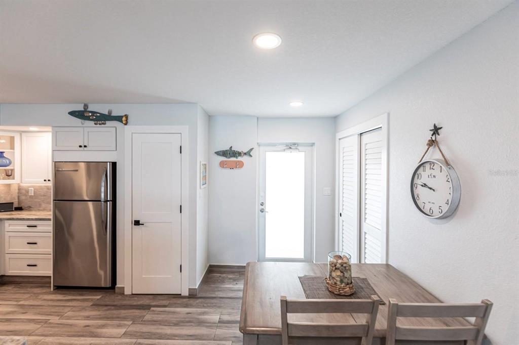 6154 Midnight Pass Road, Unit 202 Sarasota, FL 34242 - Photo 25 of 26 a view of a room with wooden floor