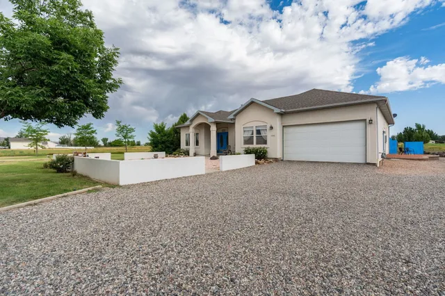 a view of house with outdoor space and street view